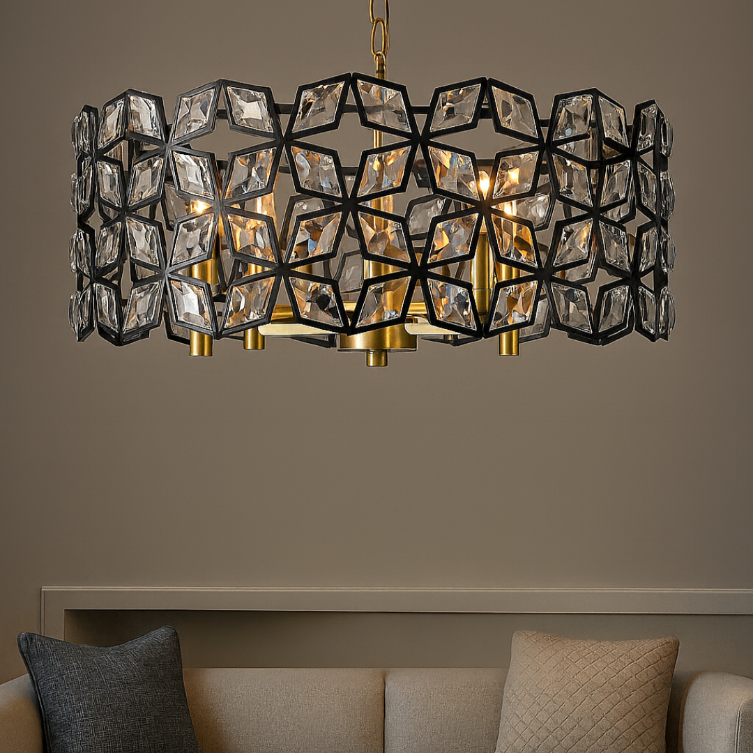 Modern chandelier hanging above a living room with a sofa and coffee table.