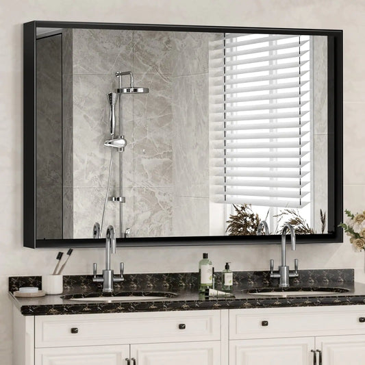 Bathroom vanity with large mirror, sink, and shower fixtures.